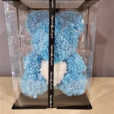blue bear made out of silk roses 